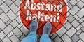 Warning: Abstand halten! in German Keep your distance! Royalty Free Stock Photo